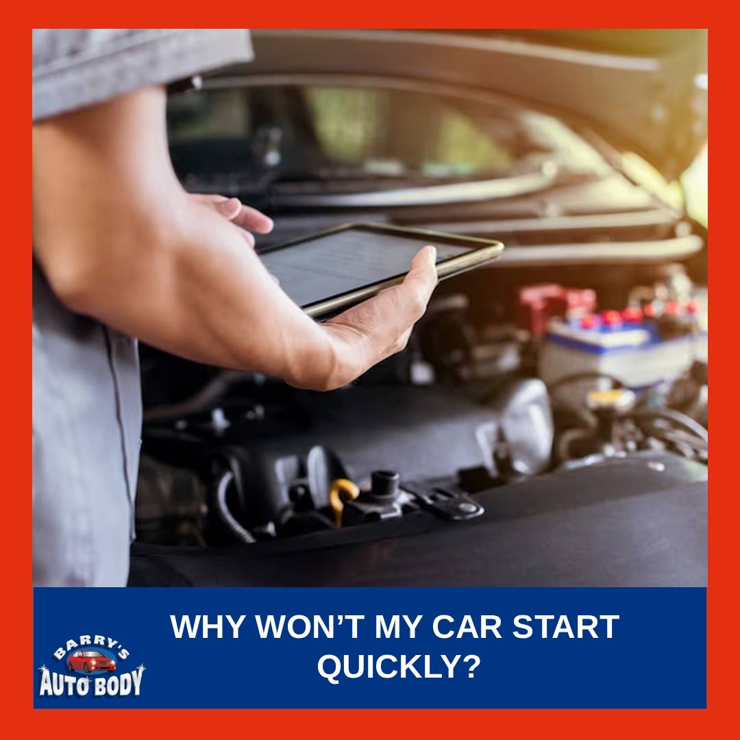 Driver turning car key while engine cranks slowly, indicating possible starting issue.