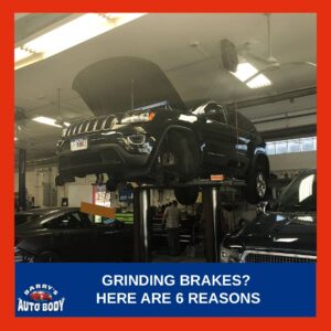 Close-up of car brakes making a grinding noise, showing worn pads and rotor surface.